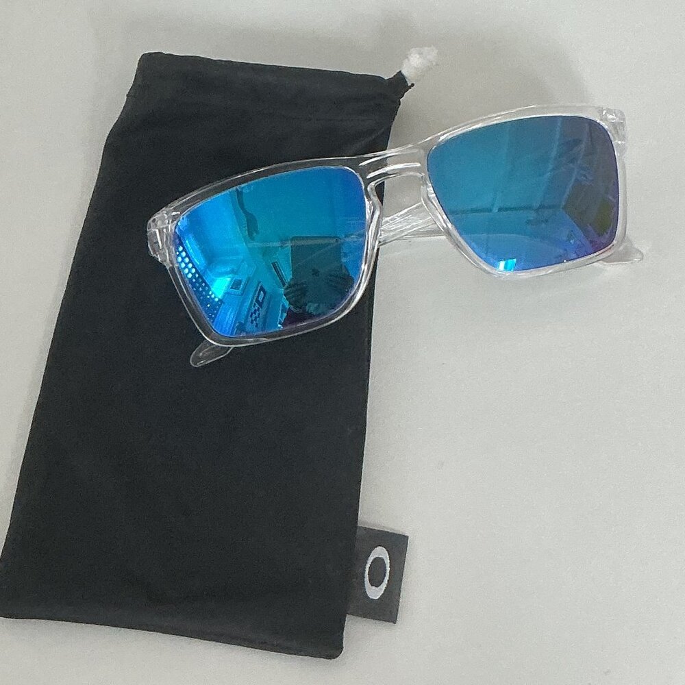 Oakley Holbrook Sunglasses - clear with blue lenses.